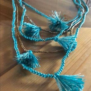 Anthropologie turquoise tassel necklace.